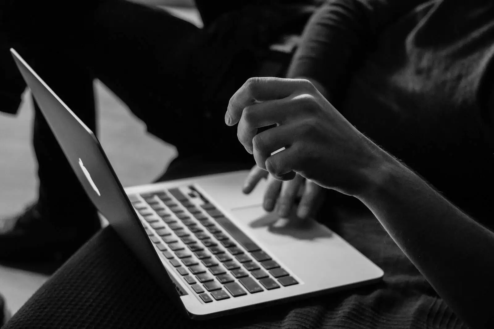a person deregistering their business online using their laptop